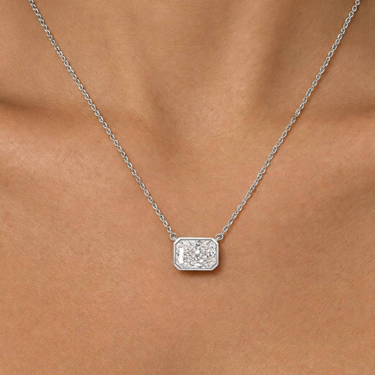 Lab-Grown Diamond Radiant Solitaire Bezel Pendant Necklace in 14K White Gold or 14K Yellow Gold