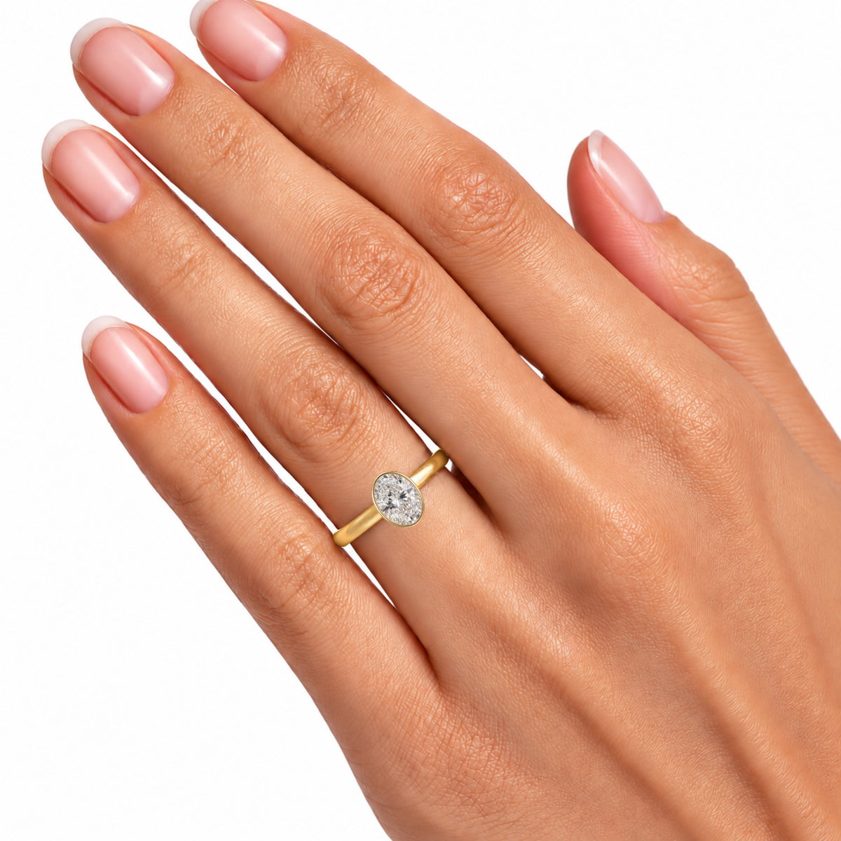 1 to 6 ct. T.W. Lab-Grown Diamond Oval Cut Solitaire Bezel Engagement Ring in 14K White Gold or 14K Yellow Gold