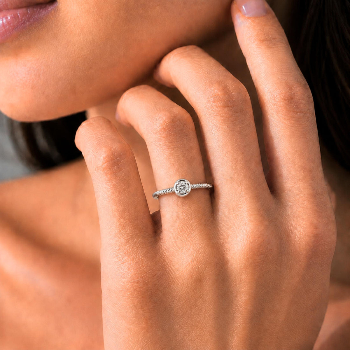 0.15 ct. T.W. Lab-Grown Diamond Round Bezel Engagement Ring in 14K White Gold or 14K Yellow Gold