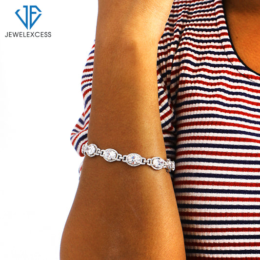 14 ct. T.G.W. Created White Sapphire Halo Bracelet with Diamond Accent in Sterling Silver