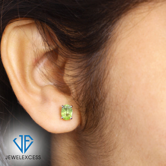 2.50 ct. T.G.W. Peridot Oval Stud Earrings in Sterling Silver