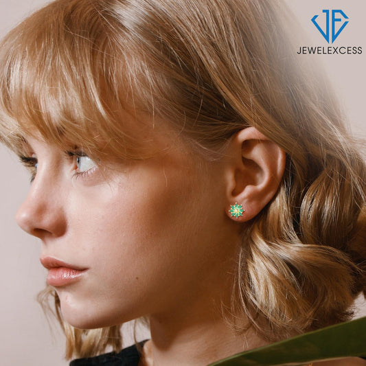 1 1/4 ct. T.G.W. Emerald Flower Stud Earrings with Diamond Accent in 14K Gold over Silver