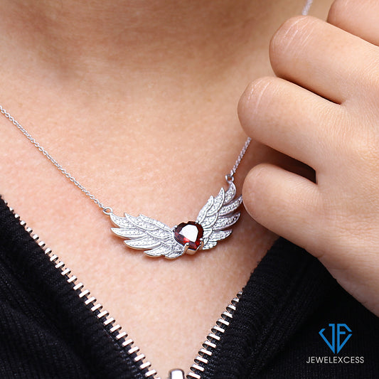 1 3/4 ct. T.G.W. Garnet & 1/10 ct. T.W. White Diamond Pendant in Sterling Silver