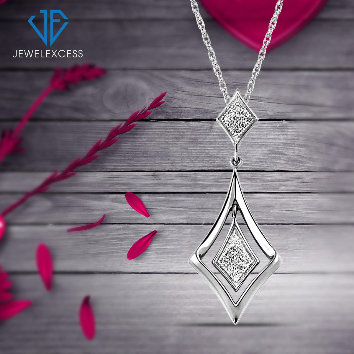 1/20 ct. T.W. White Diamond Pendant in Sterling Silver