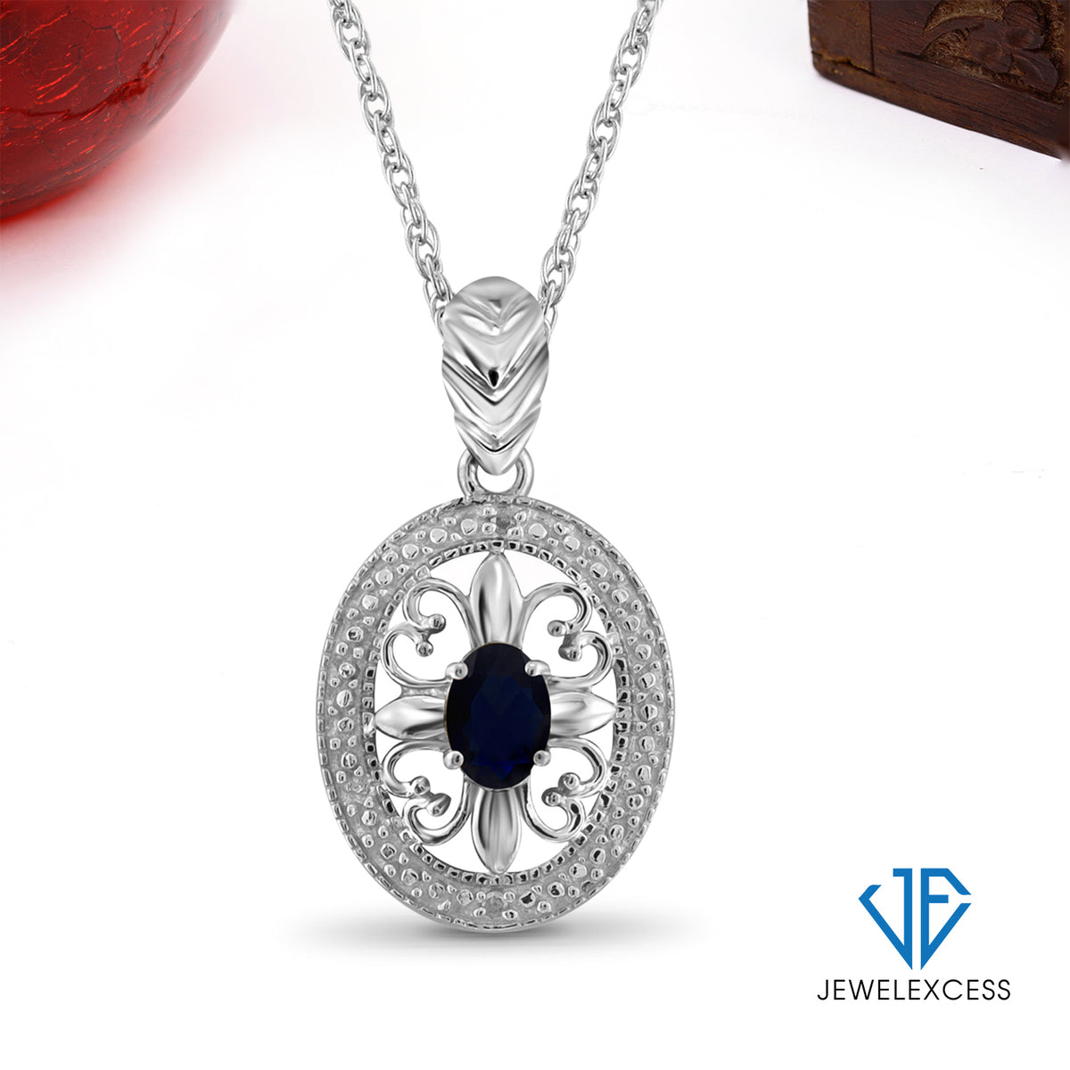 1/2 ct. T.G.W. Sapphire Pendant with Diamond Accent in Sterling Silver