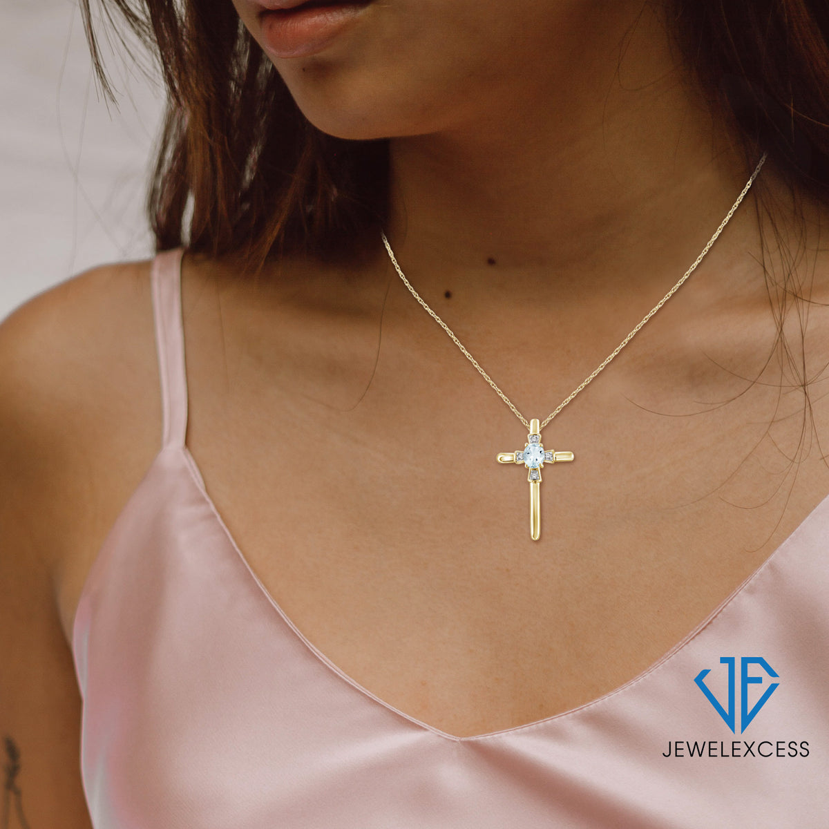 1/4 ct. T.G.W. Aquamarine Cross Pendant with Diamond Accent in 14K Gold over Silver