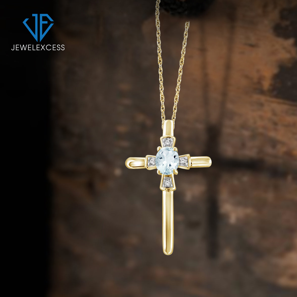 1/4 ct. T.G.W. Aquamarine Cross Pendant with Diamond Accent in 14K Gold over Silver
