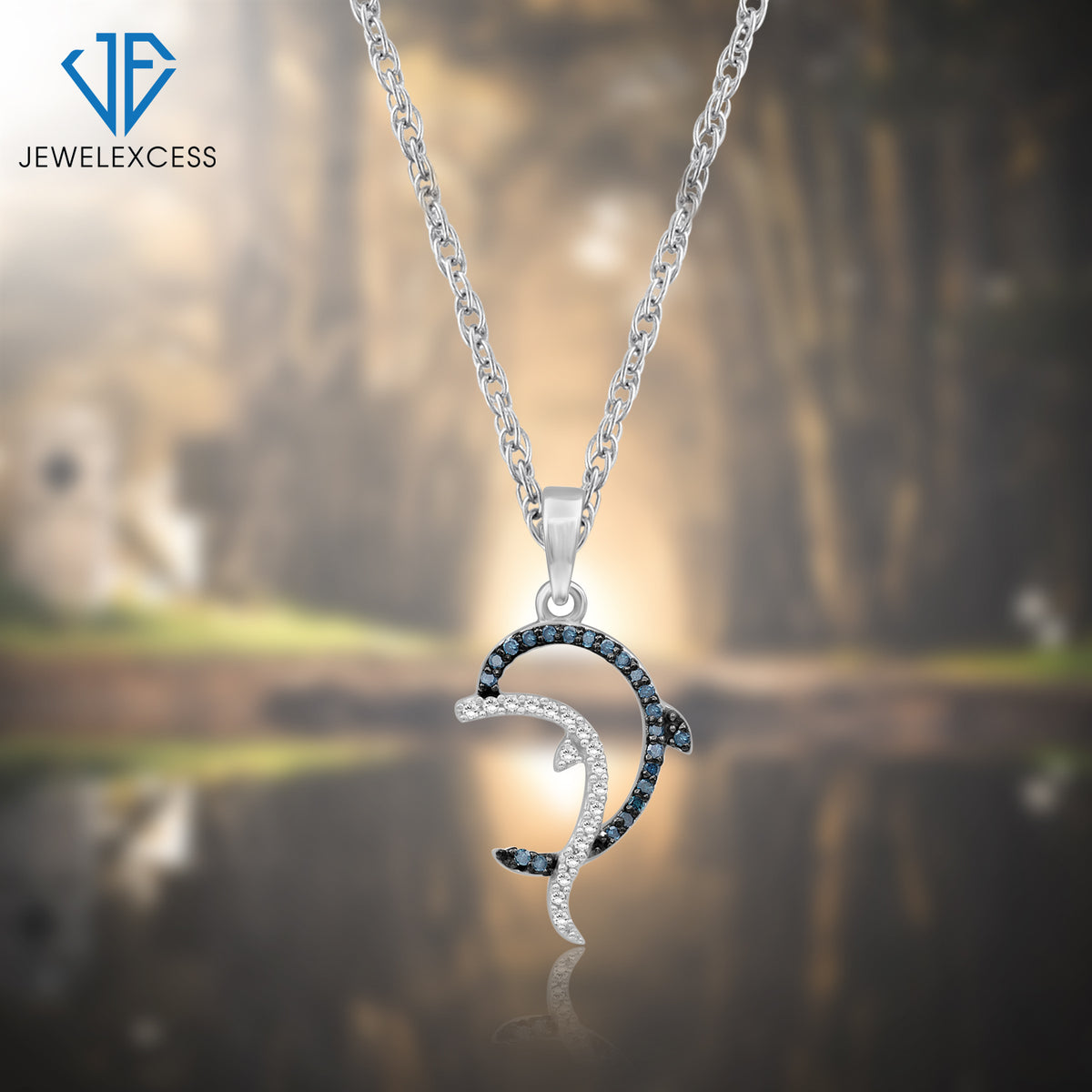 1/10 ct. T.W. Blue & White Diamond Pendant in Sterling Silver