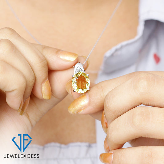 5.40 ct. T.G.W. Citrine & 1/20 ct. T.W. White Diamond Pendant in Sterling Silver