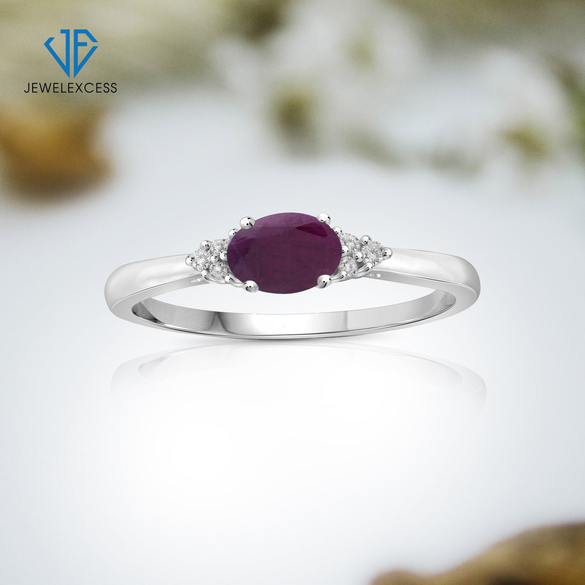 0.50 ct. T.G.W. Ruby Ring with Diamond Accent in Sterling Silver