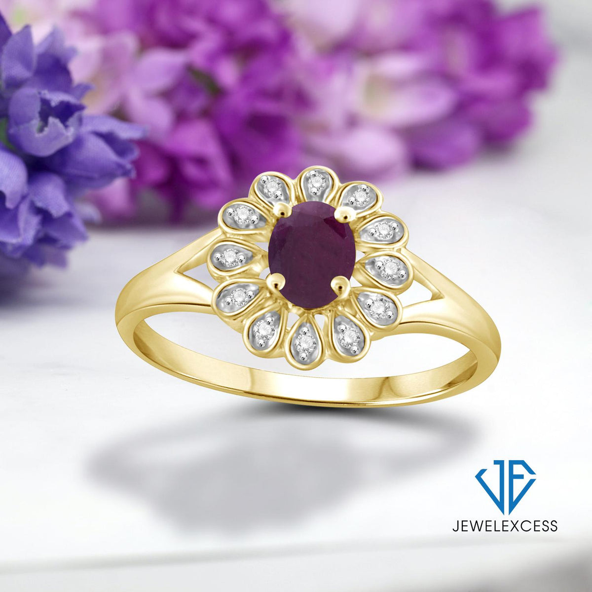0.25 ct. T.G.W. Ruby Ring with Diamond Accent in 14K Gold over Silver