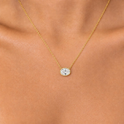 Lab-Grown Diamond Oval Solitaire Bezel Pendant Necklace in 14K White Gold or 14K Yellow Gold