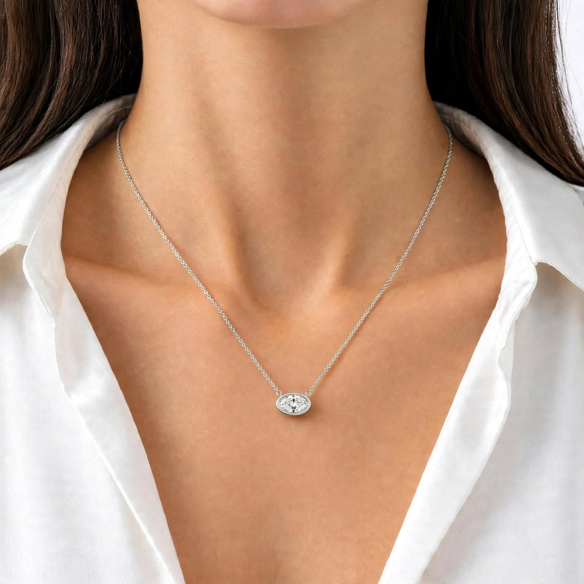 Lab-Grown Diamond Oval Solitaire Bezel Pendant Necklace in 14K White Gold or 14K Yellow Gold