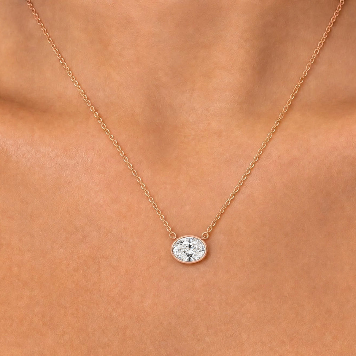 Lab-Grown Diamond Oval Solitaire Bezel Pendant Necklace in 14K White Gold or 14K Yellow Gold