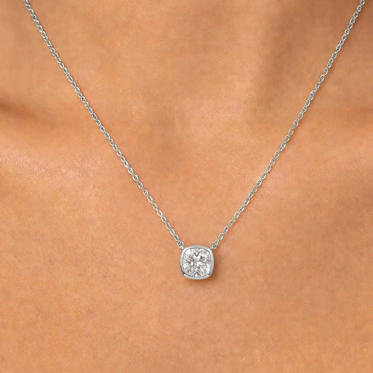 Lab-Grown Diamond Cushion Solitaire Bezel Pendant Necklace in 14K White Gold or 14K Yellow Gold