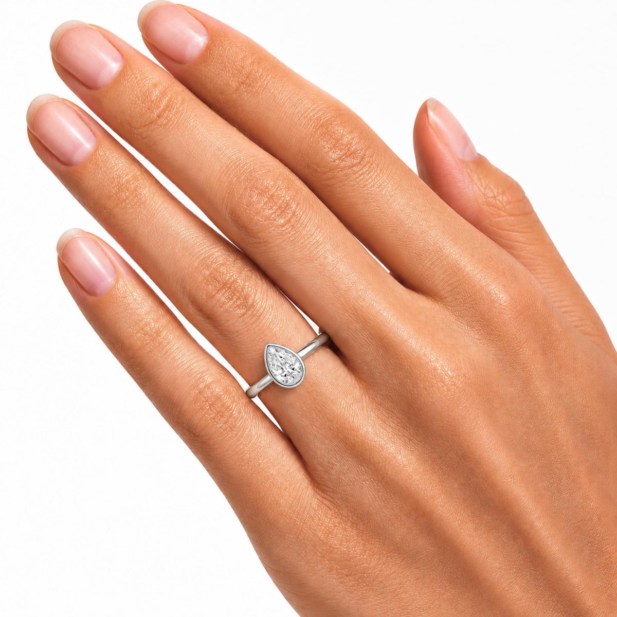 1 to 6 ct. T.W. Lab-Grown Diamond Pear Cut Solitaire Bezel Engagement Ring in 14K White Gold or 14K Yellow Gold