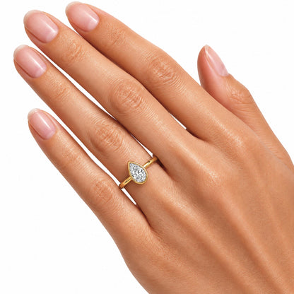 1 to 6 ct. T.W. Lab-Grown Diamond Pear Cut Solitaire Bezel Engagement Ring in 14K White Gold or 14K Yellow Gold