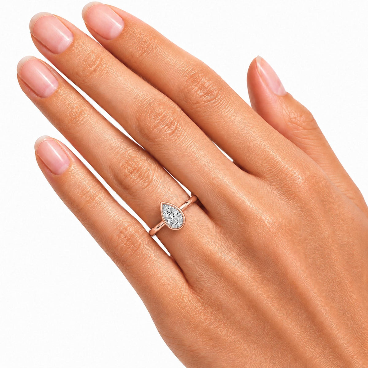 1 to 6 ct. T.W. Lab-Grown Diamond Pear Cut Solitaire Bezel Engagement Ring in 14K White Gold or 14K Yellow Gold