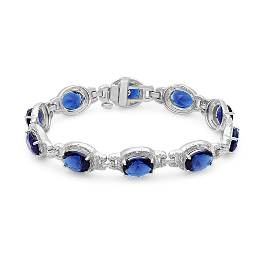 14 ct. T.G.W. Created Sapphire Halo Bracelet with Diamond Accents in Sterling Silver