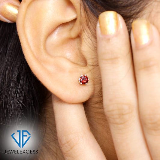 0.60 ct. T.G.W. Garnet Stud Earrings in Sterling Silver