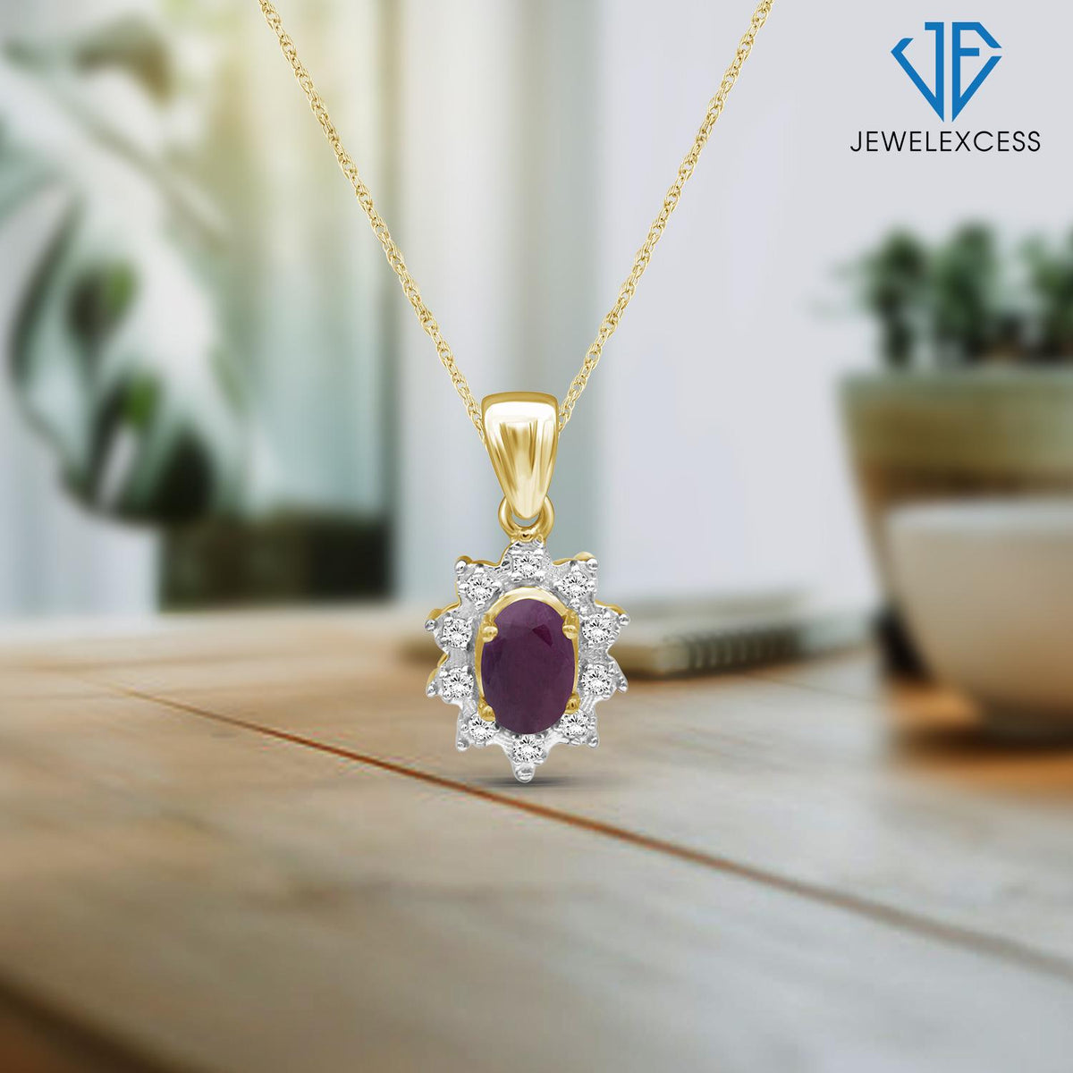 0.55 ct. T.G.W. Ruby & White Topaz Pendant in 14K Gold over Silver