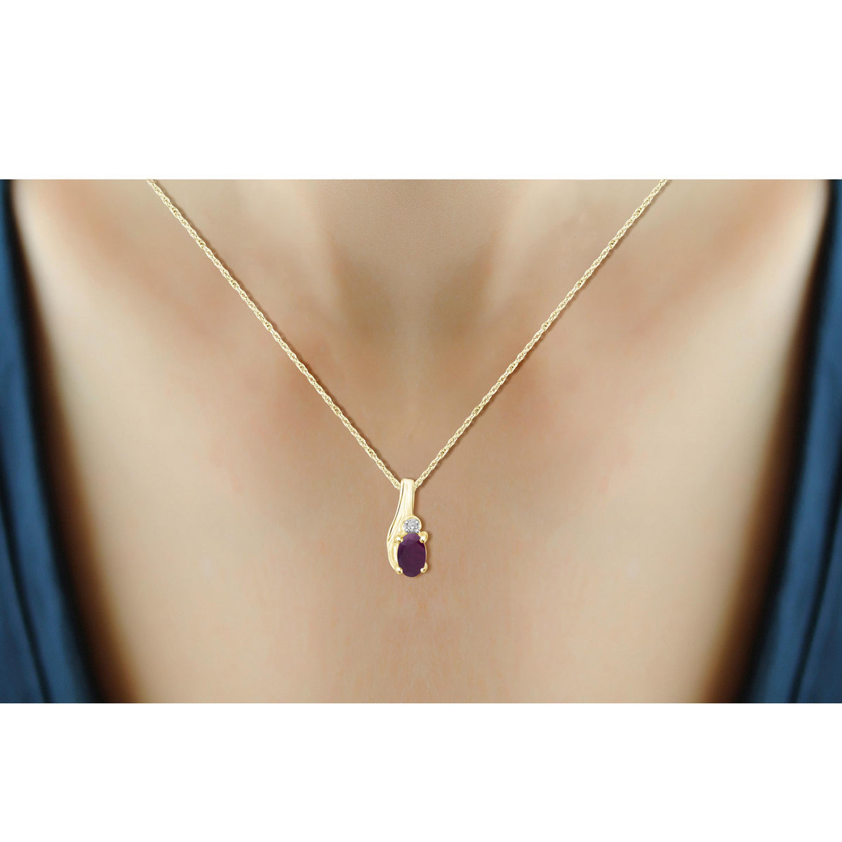 1/4 ct. T.G.W. Ruby Pendant with Diamond Accent in 14K Gold over Silver