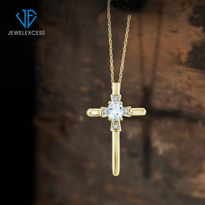 1/4 ct. T.G.W. Aquamarine Cross Pendant with Diamond Accent in 14K Gold over Silver