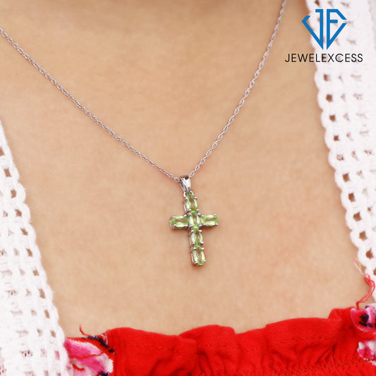 1 1/3 ct. T.G.W. Peridot Cross Pendant in Sterling Silver