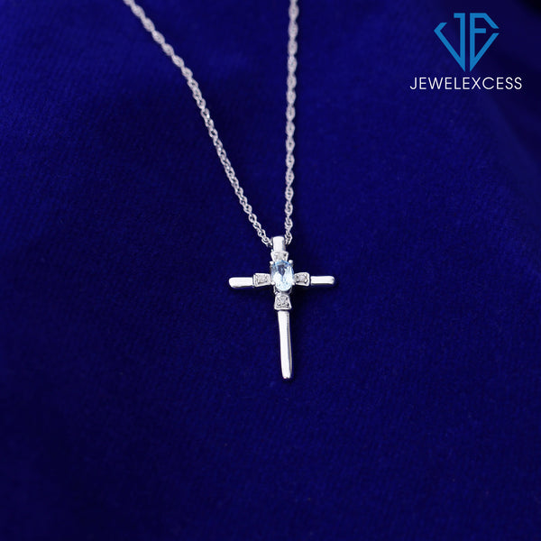 1/4 Carat T.G.W. Sky Blue Topaz And Accent White Diamond Sterling Silver Or 14K Gold-Plated Cross Pendant