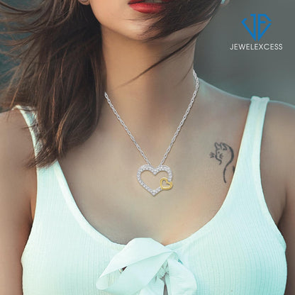 1/4 ct. T.W. White Diamond Heart Pendant in Two-Tone Sterling Silver