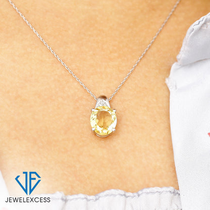 5.40 ct. T.G.W. Citrine & 1/20 ct. T.W. White Diamond Pendant in Sterling Silver