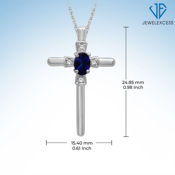 1/7 Carat T.G.W. Created Sapphire And Accent White Diamond Sterling Silver Or 14K Gold-Plated Cross Pendant