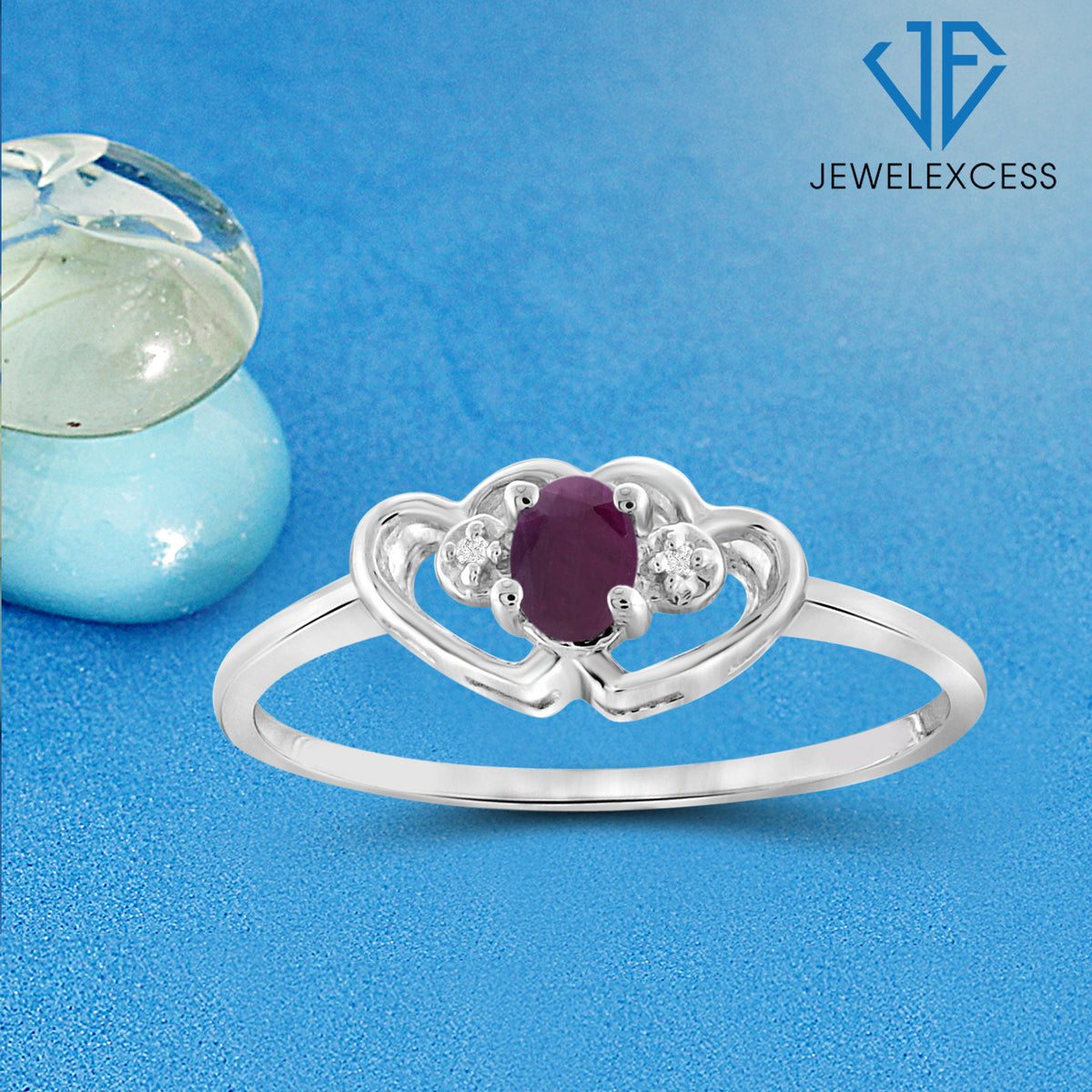 0.20 ct. T.G.W. Ruby Ring with Diamond Accent in Sterling Silver