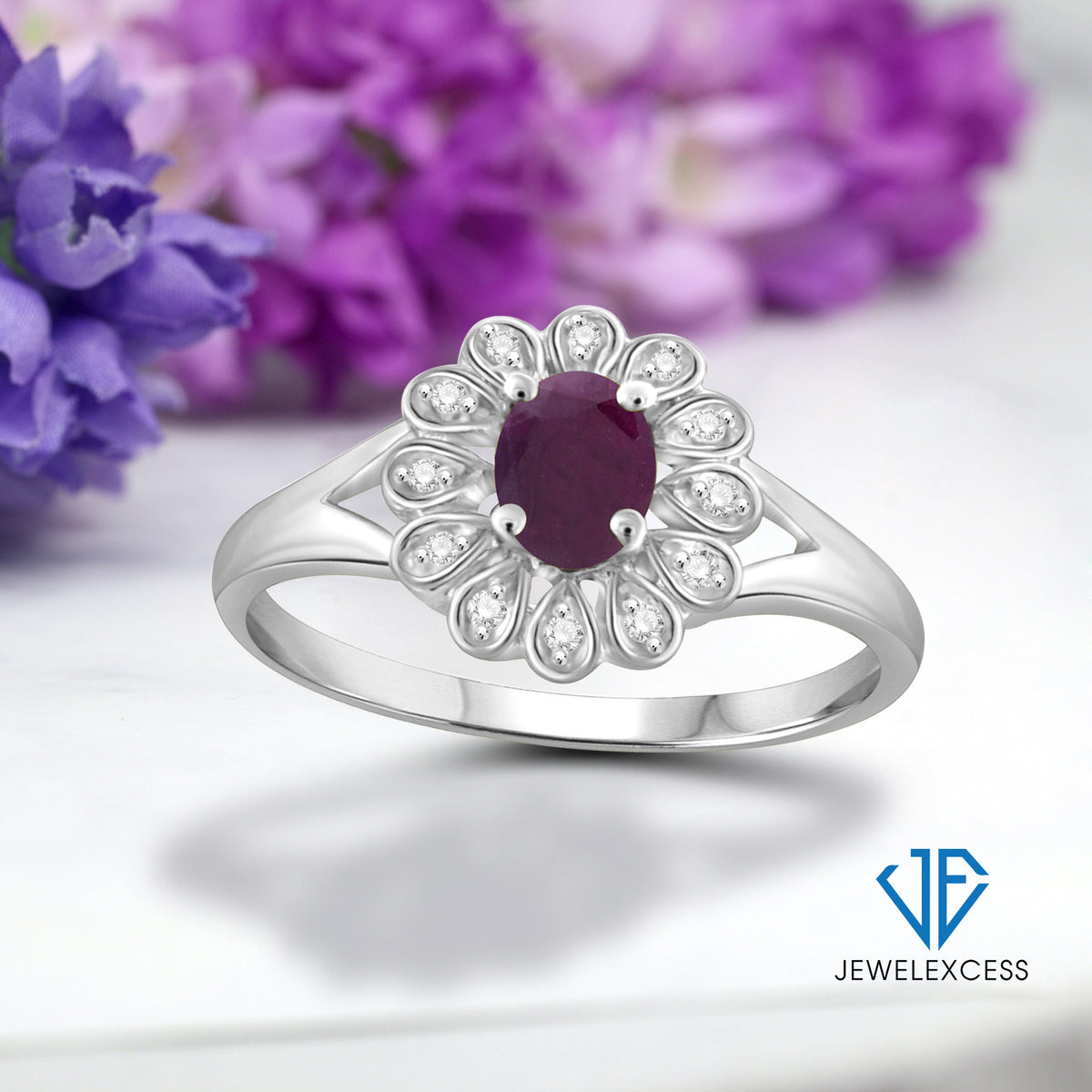 0.25 ct. T.G.W. Ruby Ring with Diamond Accent in Sterling Silver