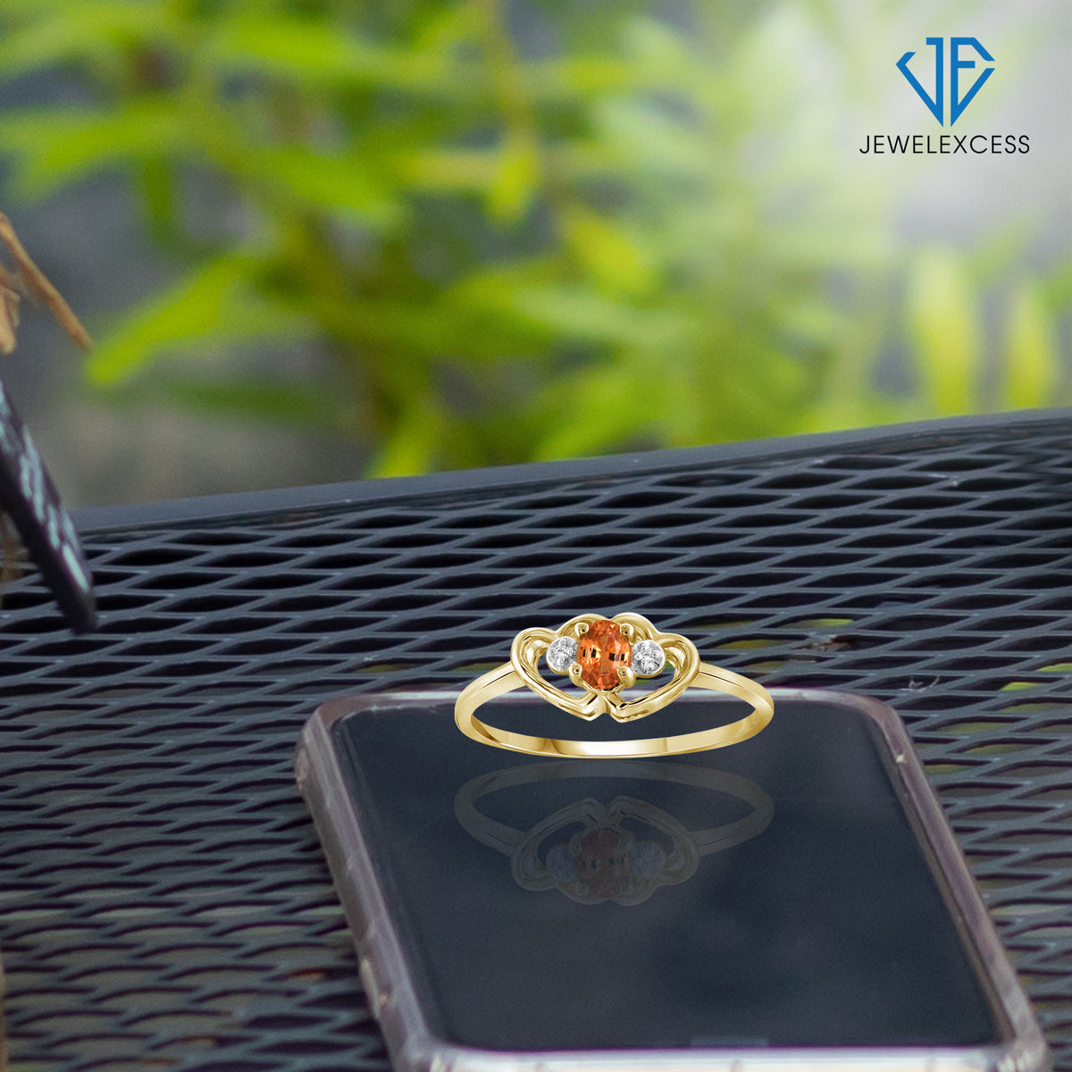 0.25 ct. T.G.W. Mandarin Garnet Ring with Diamond Accent in 14K Gold over Silver